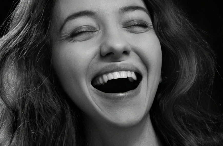 a woman with her eyes closed