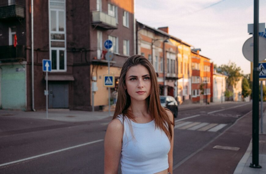 a woman standing on a street