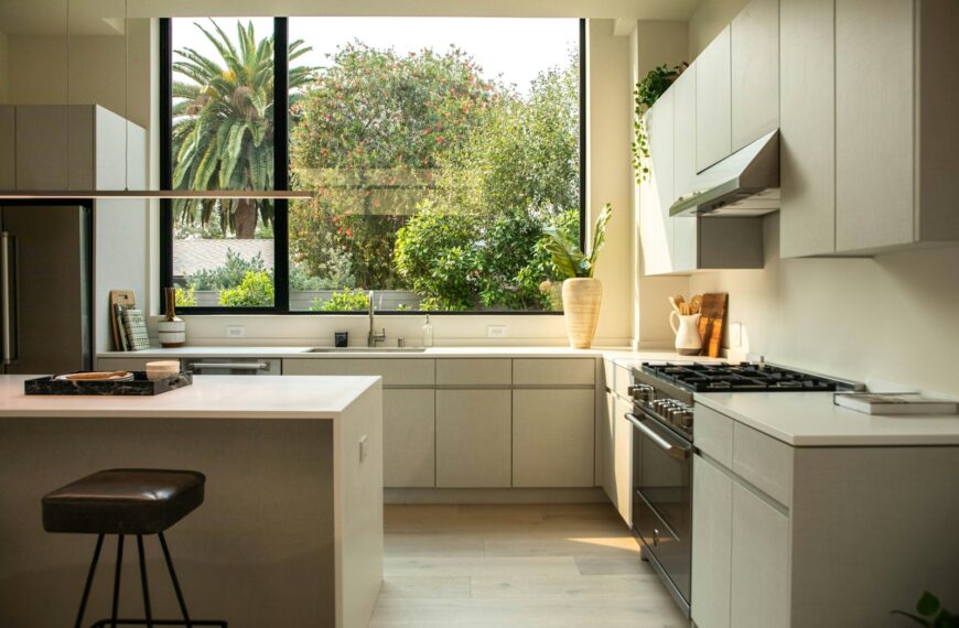 modern kitchen with island and large window
