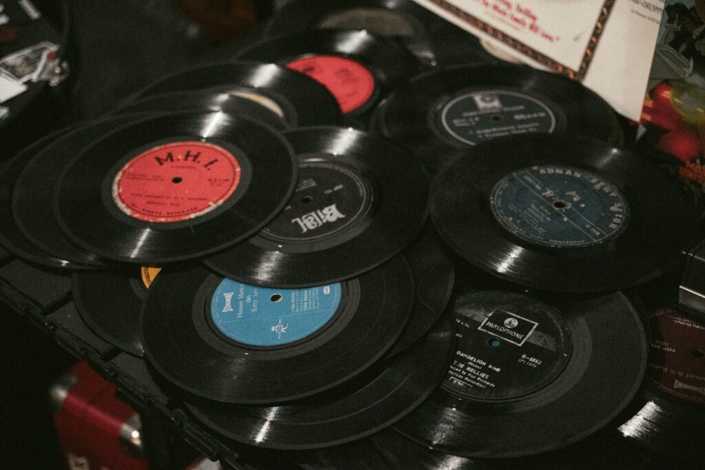 A vintage collection of vinyl records, showcasing iconic labels and retro aesthetics, perfect for music enthusiasts.