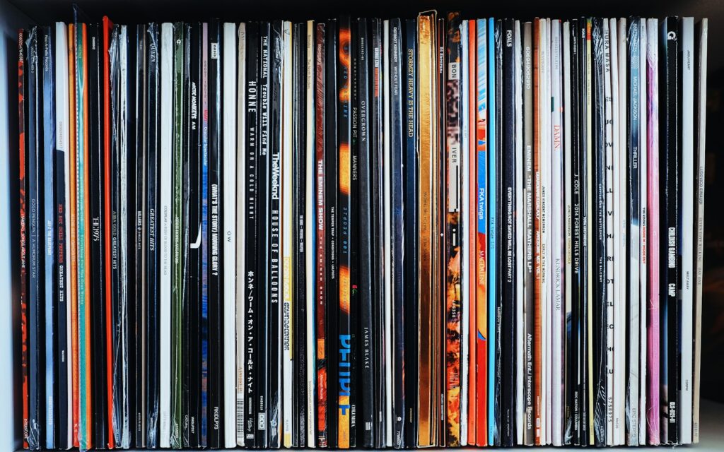 black wooden shelf with books