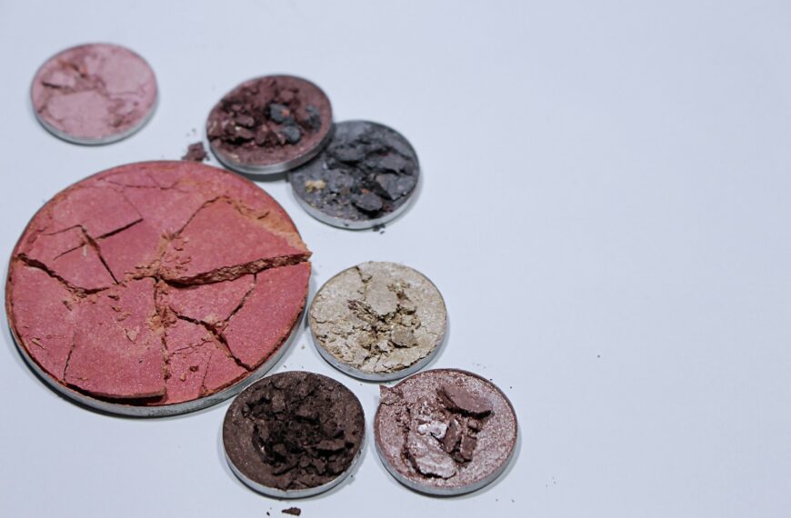 eight round silver coins on white surface