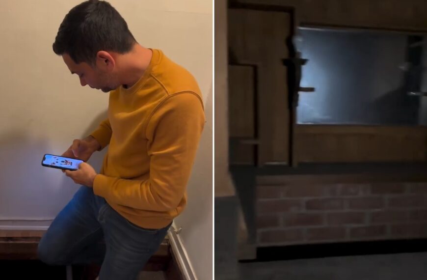 A man stepping down through a floor hatch, next to the brick-walled hidden speakeasy room beneath the house, from the creator's own Instagram reel
