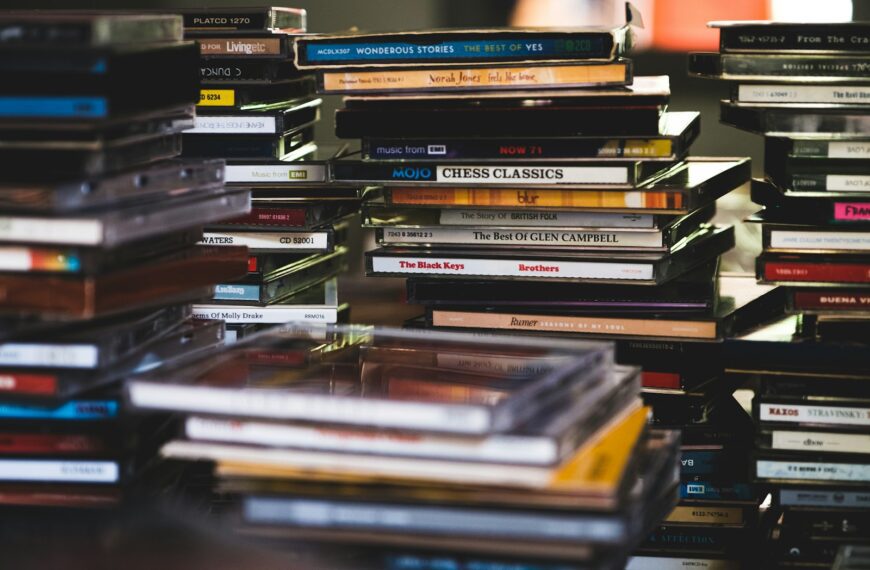 books on brown wooden shelf