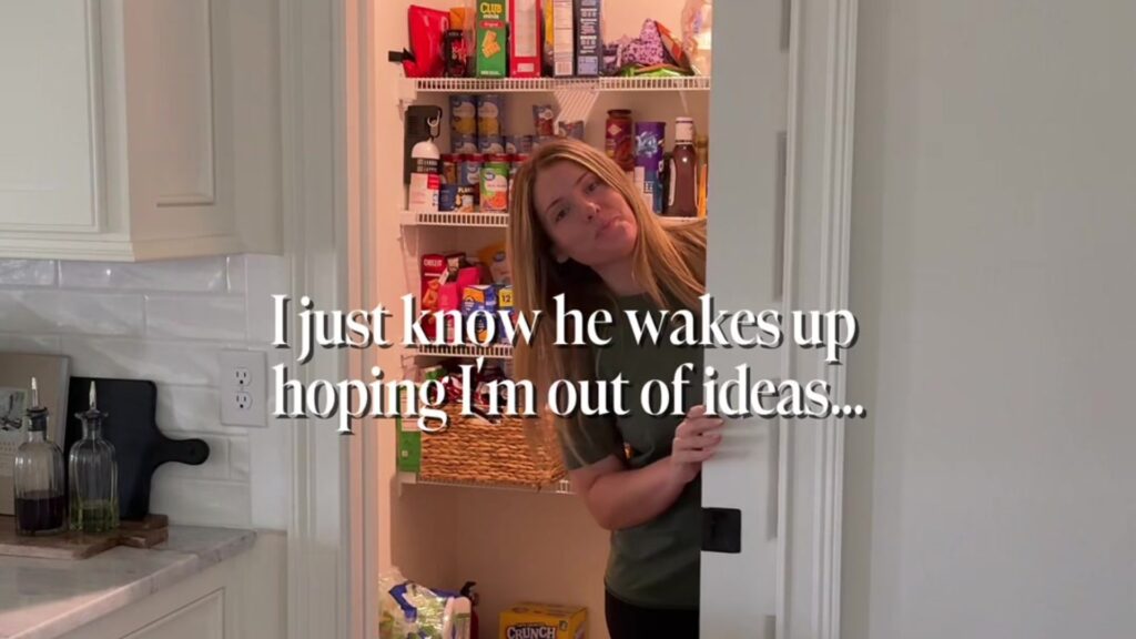 Homeowner peeking out of her pantry doorway before tearing the shelves down