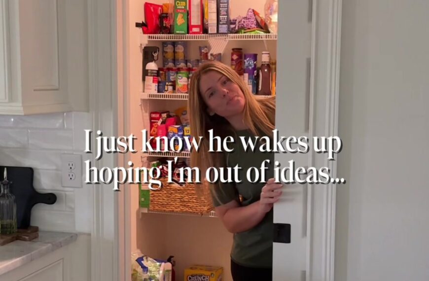 Homeowner peeking out of her pantry doorway before tearing the shelves down