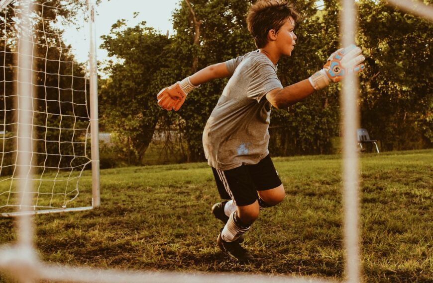 boy playing soccer