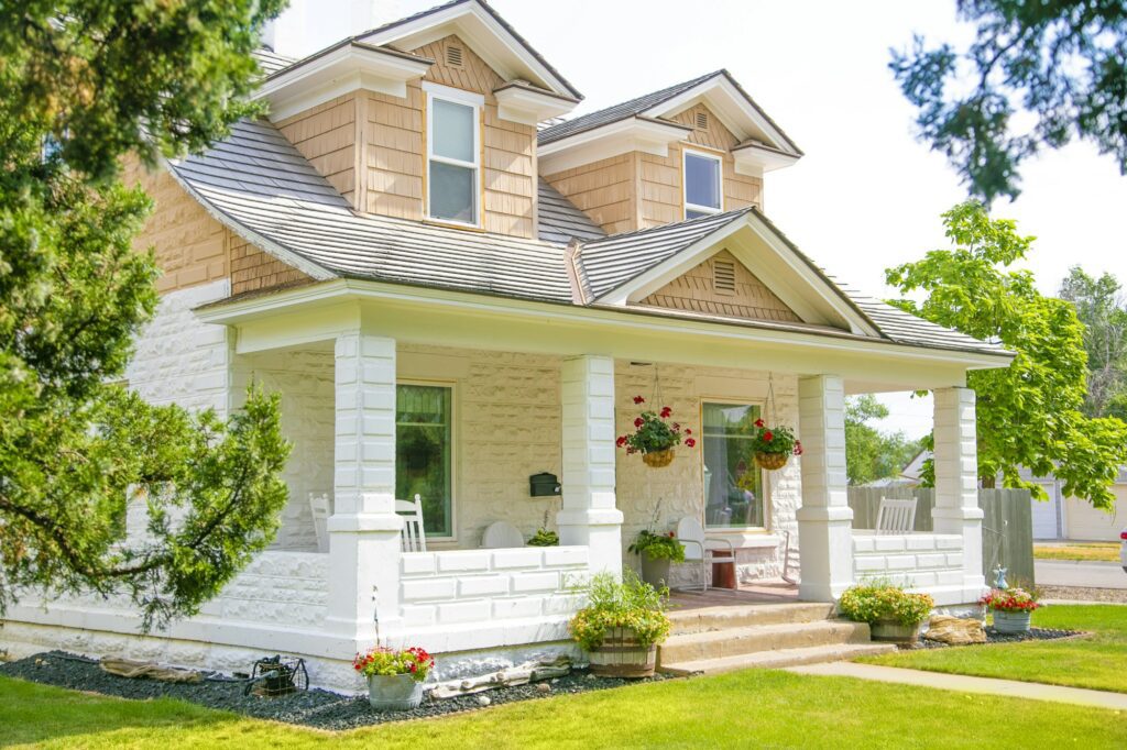 Small suburban starter home for sale on a sunny day