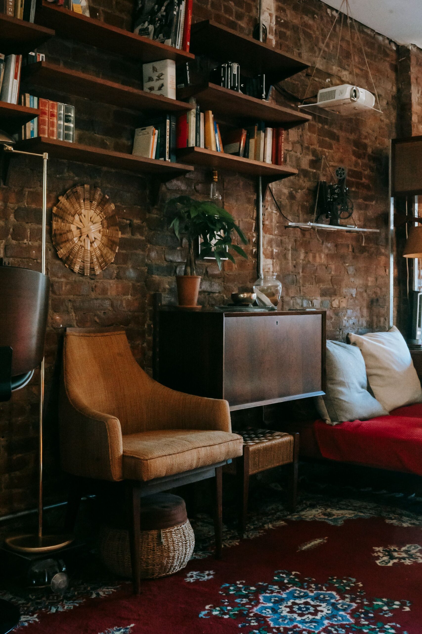 Living room styled with vintage wooden furniture and an ornamental rug, reflecting the rise in antique furniture demand