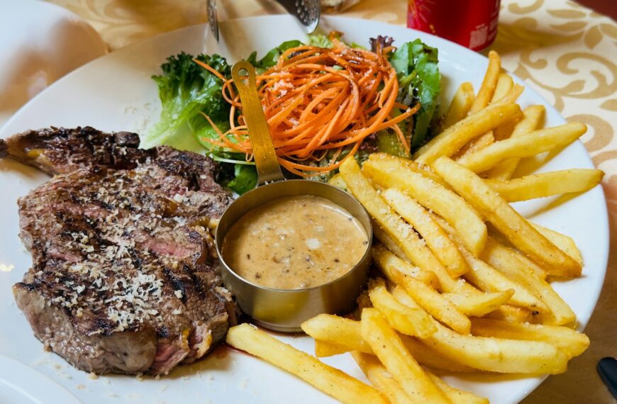 Steak with french fries and side salad