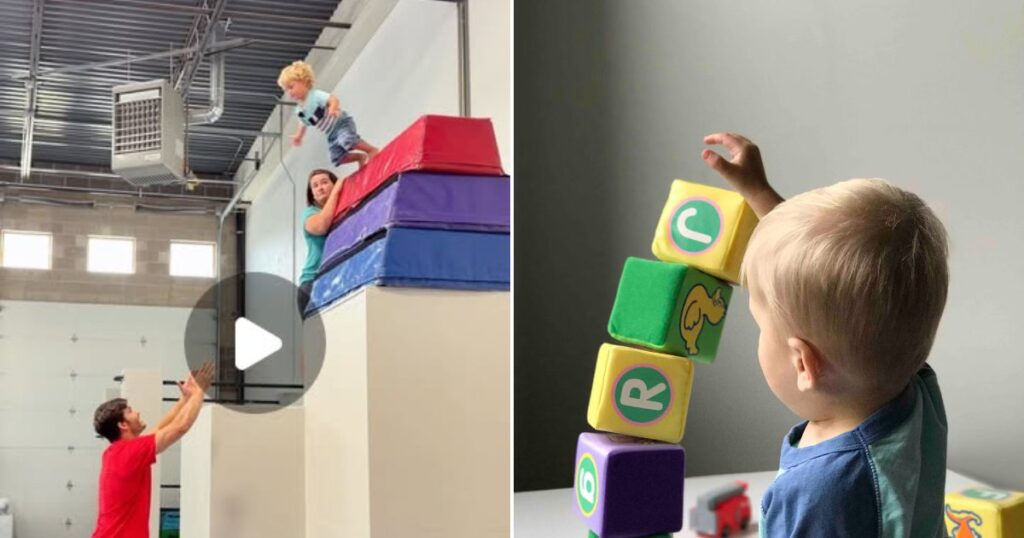 Toddler playing with soft foam blocks