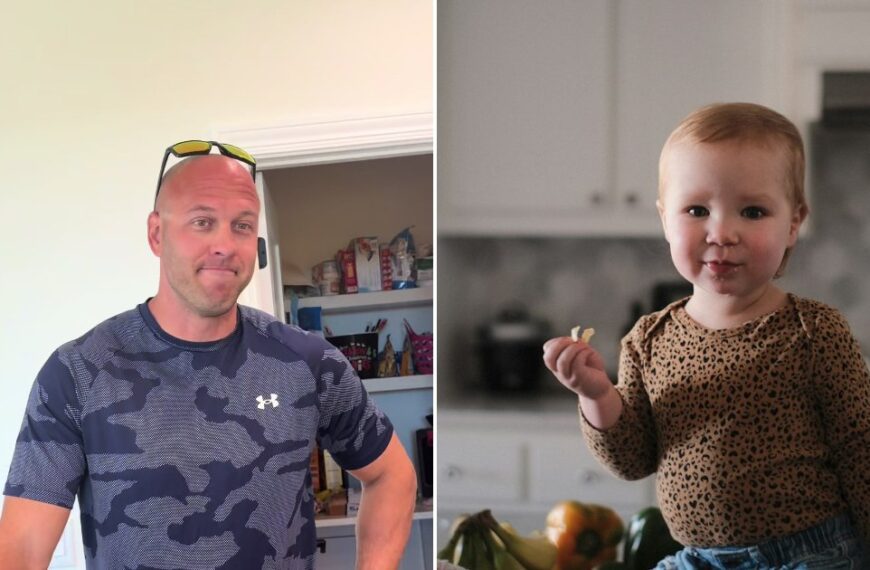 Dad in a camo shirt stands in a kitchen next to a mother and child scene