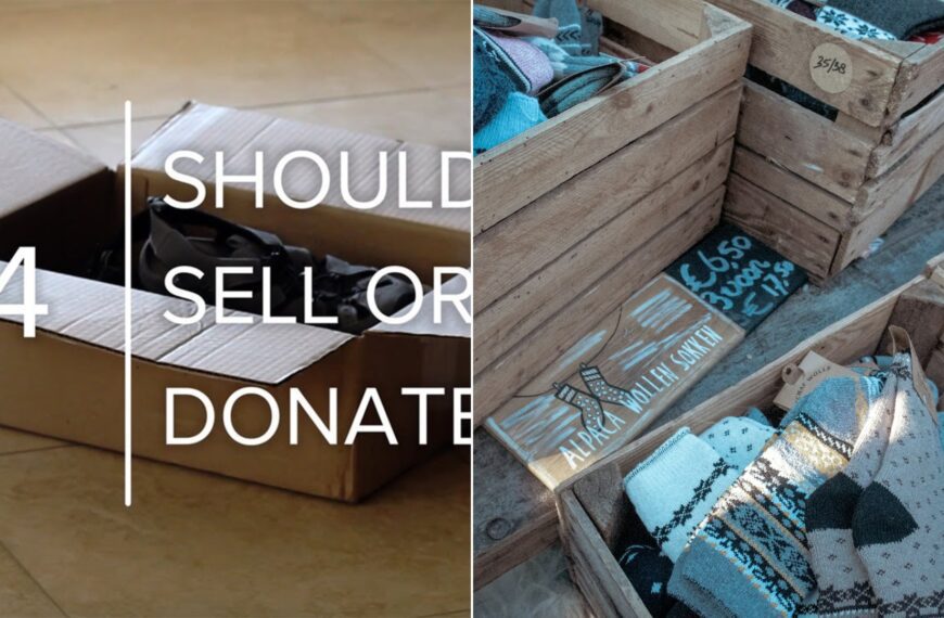 A wooden crate filled with clothing ready to be donated.