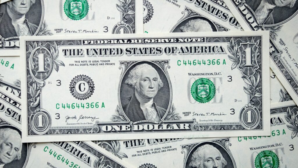 A pile of one dollar bills.