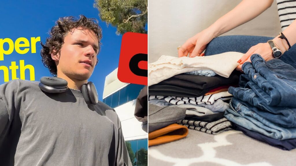 A young reseller with headphones beside a neat stack of folded clothes and jeans.