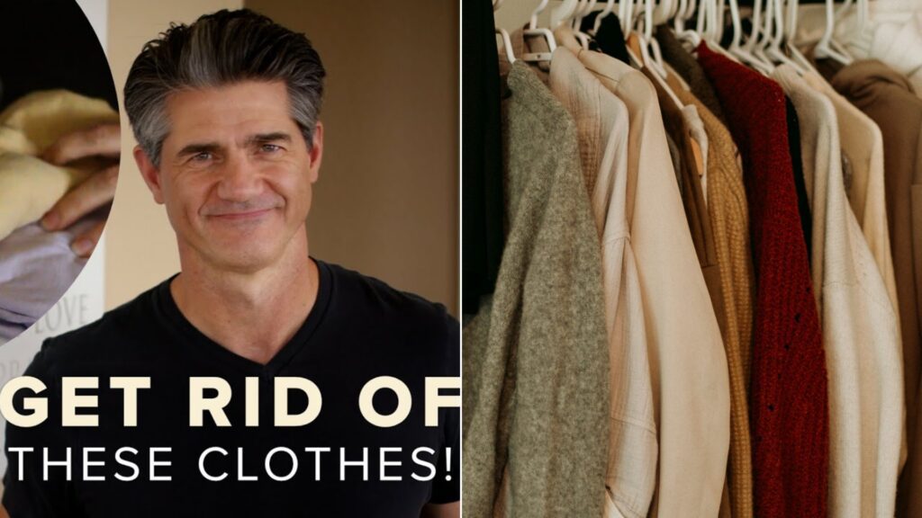 A man in a black shirt beside a coat hanging on a rack in a clothes closet.