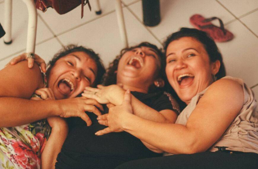 Group of women smiling and laughing together