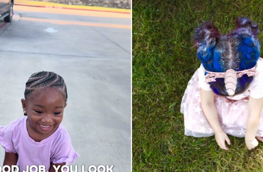 Toddler sitting in the grass