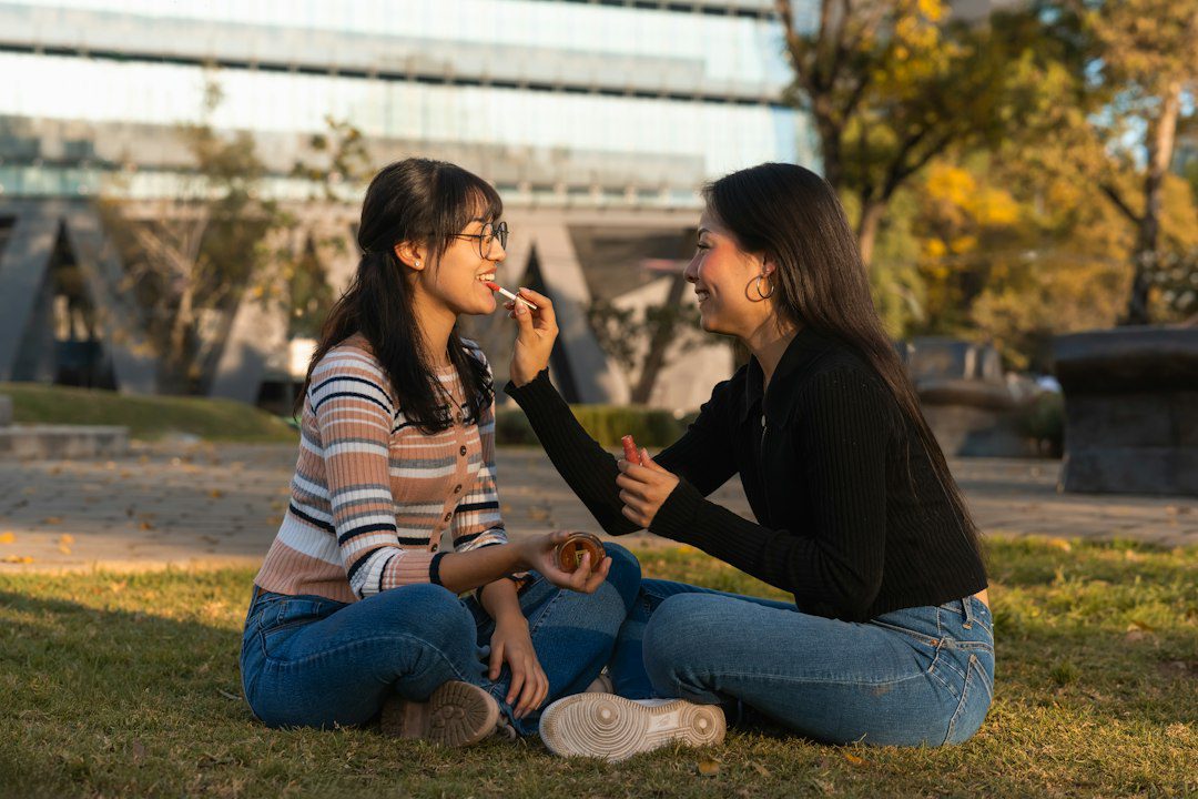 Mother and daughter sitting together having a quiet conversation