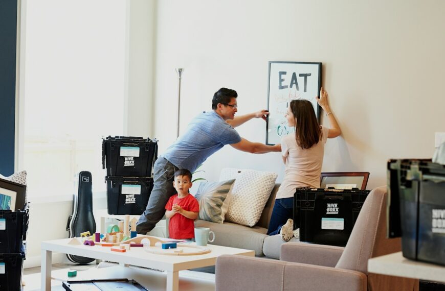 People decluttering a home with boxes