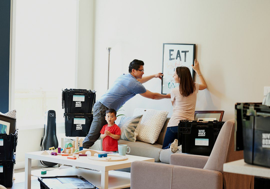 People decluttering a home with boxes