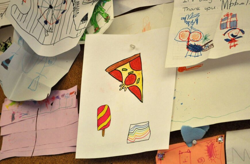 A bulletin board covered in layers of paper.