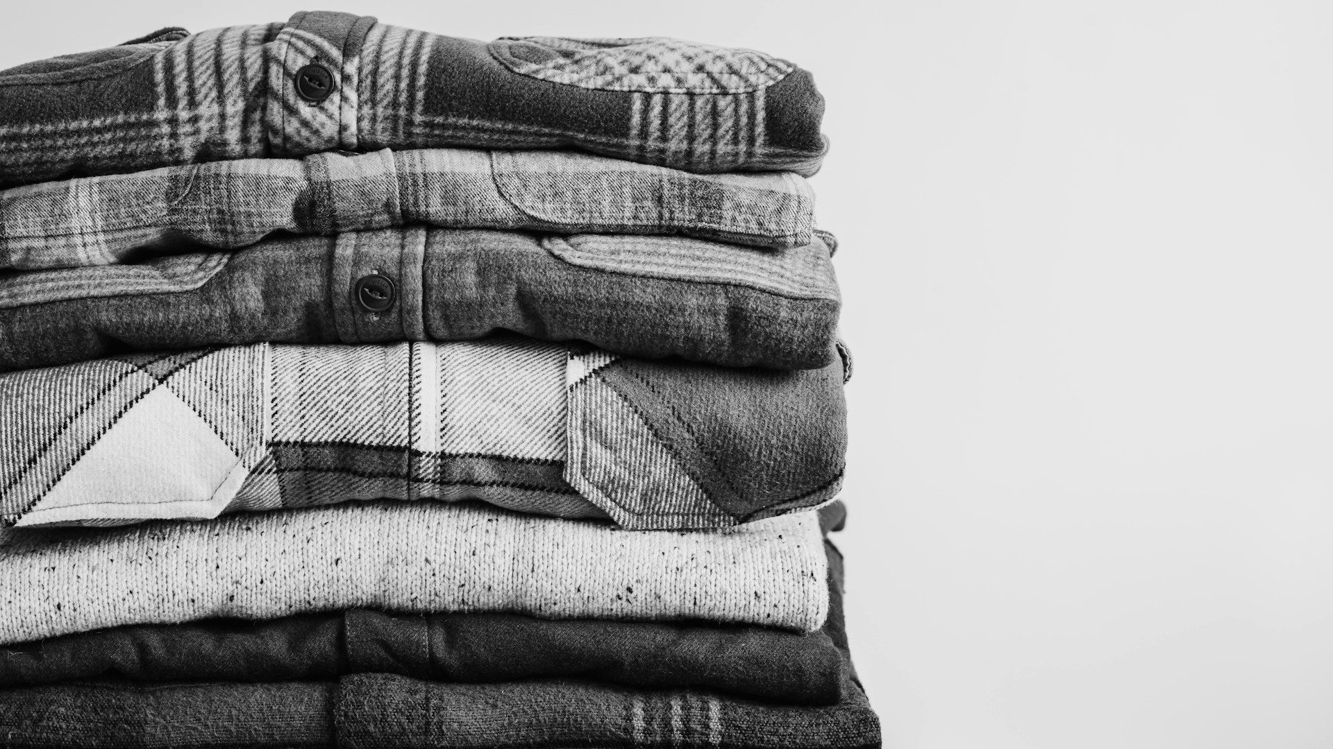 A neat stack of folded shirts.