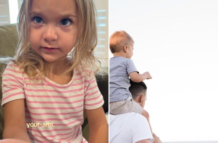 Dad carrying a toddler